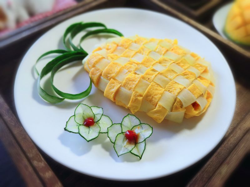 创意早餐～菠萝造型蛋炒饭成品图