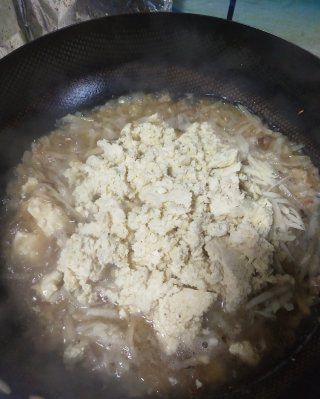 第10步(酸菜豆腐烩土豆丝的做法)