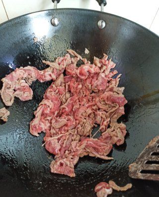 第6步(葱爆羊肉的做法)