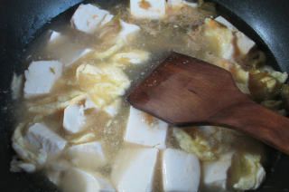 第9步(榨菜丝鸡蛋豆腐汤的做法)