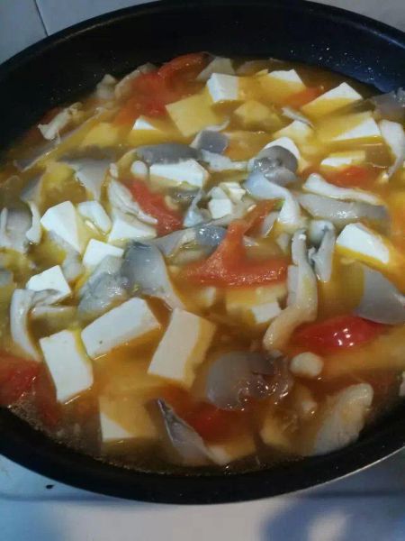 第4步(西红柿平菇豆腐汤的做法)