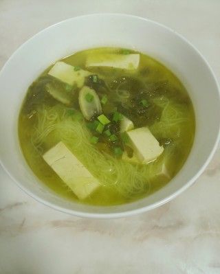 第6步(酸菜粉丝豆腐汤的做法)
