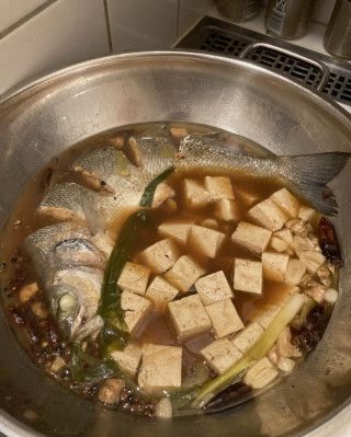 第15步(豆腐炖鱼的做法)