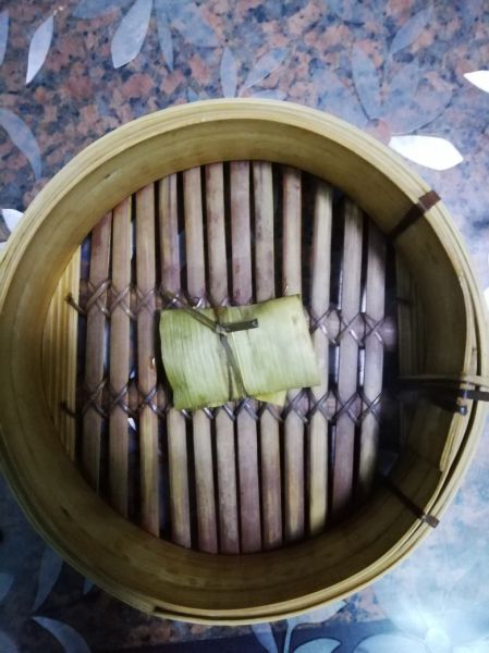 第5步(糯米、黄小米裹蒸排骨(粽叶版)的做法)